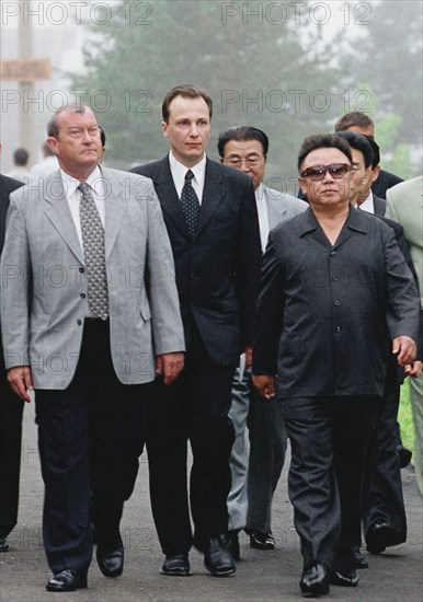 Moscow, russia, july 27, 2001, north korean leader kim chong il (r) and presidential envoy in the far eastern federal district konstantin pulikovsky (l) who met the guest at his arrival in the khasan railway station, the first one in the russian territory, kim chong il arrived on an official visit on president vladimir putin's invitation and will spend in russia about 10 days, the major part of it in the train crossing the vast country.