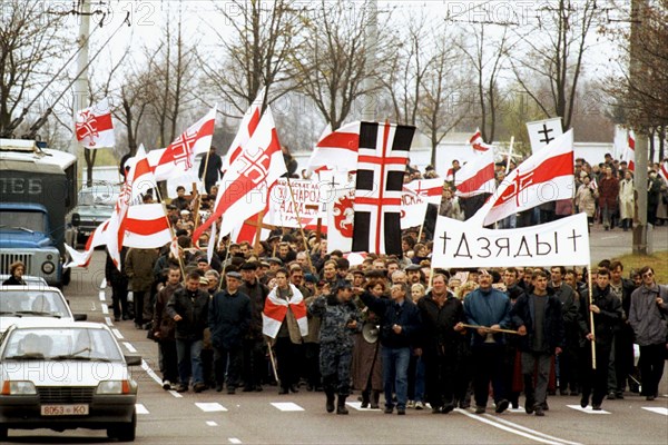 Minsk, belorussia, october 29, 2000, a view of the funeral mach to kuropaty, in the outskirts of minsk where tens of thousands of innocent people had been shot dead during the years of the stalinist political repressions, activists and supporters of the belarus opposition hold today an authorised march commemorating the victims of the stalinist repressions, the march is timed to coincide with day commemorating ancestors, or dziady in belarussian.