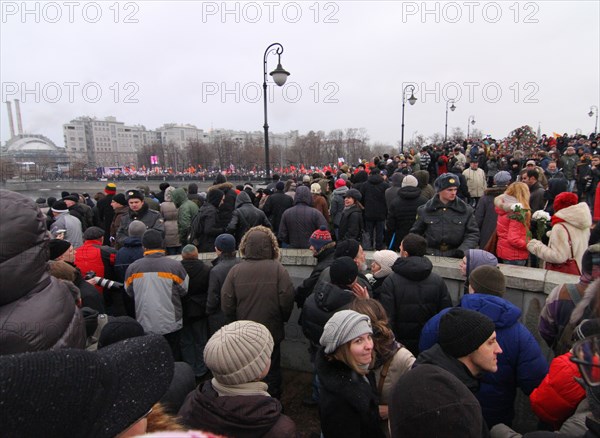 Moscow, russia, december 10, 2011, people attend an authorized rally 'for honest elections' in moscow's bolotnaya square to protest against electoral fraud at recent elections to the state duma.