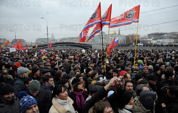 Moscow, russia, december 10, 2011, people attend an authorized rally 'for honest elections' in moscow's bolotnaya square to protest against electoral fraud at recent elections to the state duma.