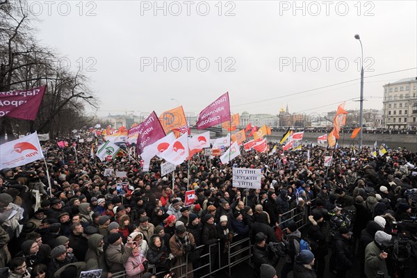 Moscow, russia, december 10, 2011, people attend an authorized rally 'for honest elections' in moscow's bolotnaya square to protest against electoral fraud at recent elections to the state duma.