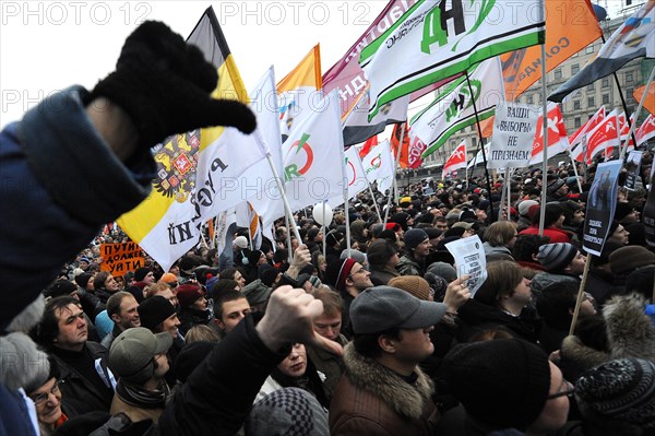 Moscow, russia, december 10, 2011, people attend an authorized rally 'for honest elections' in moscow's bolotnaya square to protest against electoral fraud at recent elections to the state duma.