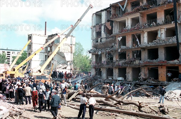 Makhachkala, russia, september 7, 1999, the death toll from a blast in a 5-storey dwelling house in the daghestani town of buinaksk occurred on sept,4, has reached 61, however, this figure is not final as the clearing the debris is still in progress (ops),the list of casualties includes 21 children and 18 women, ten victims have not yet been identified, altogether 145 people were injured by the blast.