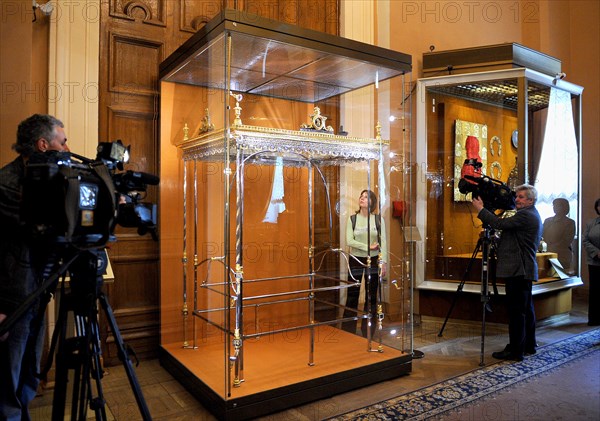 Moscow, russia, march 5, 2009, the cradle in which alexander romanov (the future russian tsar alexander i) is thought to have slumbered in his early years, on display at the armoury (armory) chamber, kremlin, moscow.