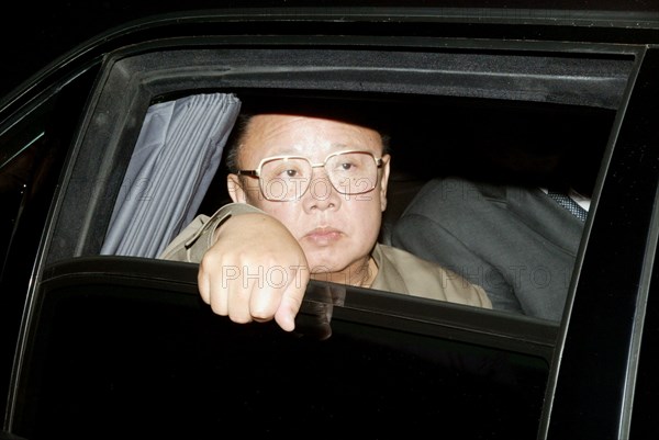 Vladivostok, russia, august 23, 2002, north korean leader kim jong-il looks through the window of his automobile in vladivostok on friday, the korean leader has ended his visit to the ended the city today.