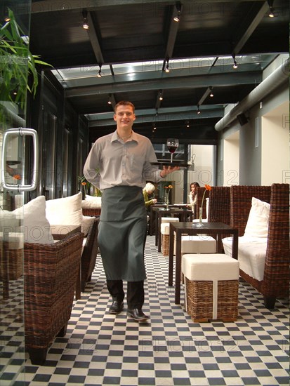 A waiter of the restaurant of the hotel bergs, riga, latvia, 2003.