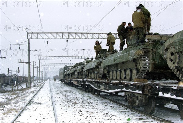 Chechnya, 1/3/97: last russian units leaving chechnya while technical troops such as engineers, railway and rear services stay behind.