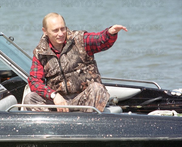 Astrakhan, russia, april 27 2002, president vladimir putin during his meeting with fishermen in the volga delta,    27,04,2002.