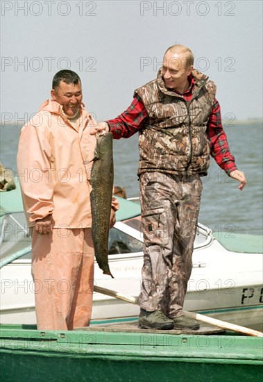 Astrakhan, russia, april 27 2002, president vladimir putin during his meeting with fishermen in the volga delta,   27,04,2002.