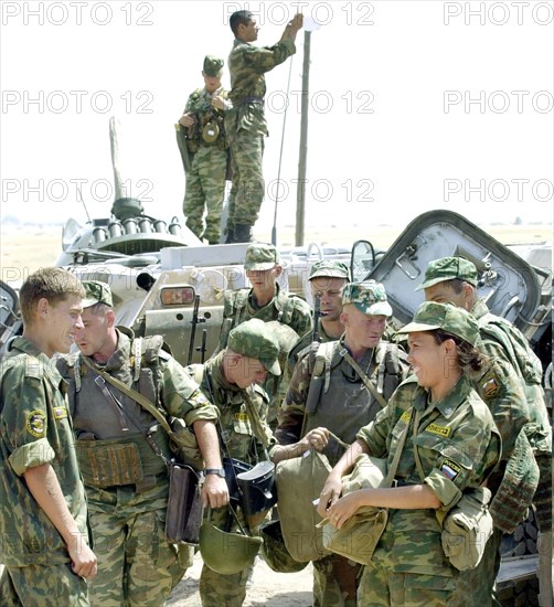 Exercises of 201st russian motorized infantry in tajikistan - july 6, 2002, men of a quick deployment battalion of 201st russian motorized infantry division from the strength of the cis joint peacekeeping forces in tajikistan pictured during tactical exercises at the 'lyaur' training range, the battalion is comprised only of the those serving on a contract basis, the servicemen were training combat tactics against possible intrusion of bandit formations or terrorist groups into the republic.