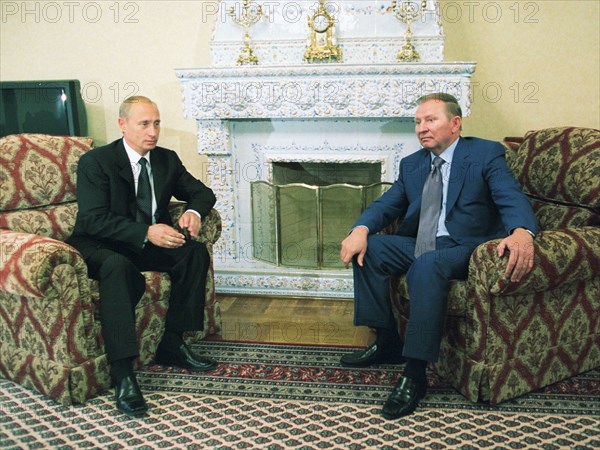 Russian president vladimir putin and ukrainian president leonid kuchma during their informal round of talks at putin's zavidovo country residence.