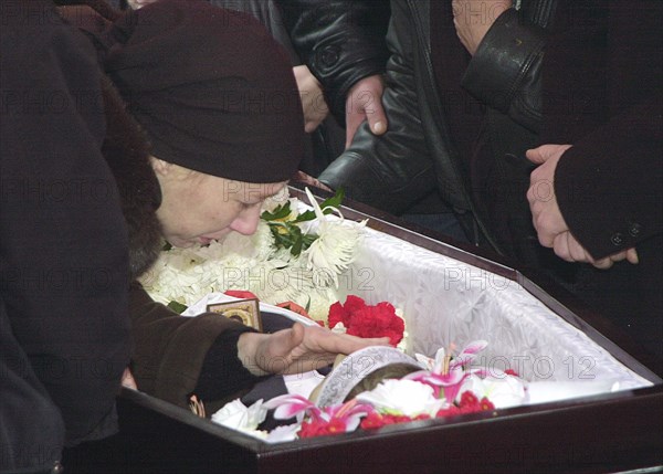 Moscow, russia, october 30 2002: funerals of soloists of the nord-ost musical kristina kurbatova and arseniy kurilenko who perished in terrorist attack against the dubrovka theatrical centre, the artistes were buried in vagankovo cemetery, konstantin kizhel.