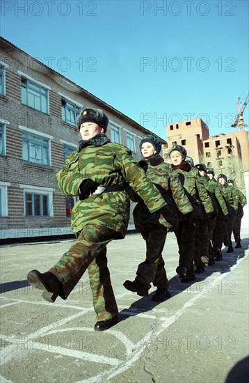 Chita region, russia, march 5 2003, marching drill (in pic) of students of border-crossing-points controllers school, the majority of the students are women, they must master small arms, cars and samples of foreign passports and visas,the theoretical course will last for three months and then they will have on-the-job-training, (photo itar-tass / yevgeny yepanchintsev)  .