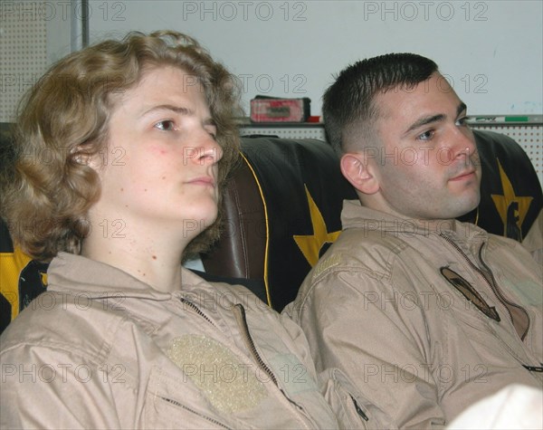 Mediterranean sea, uss theodore roosevelt, march 22, 2003, servicepersons pictured prior to the briefing for pilots, which was held here aboard the aircraft carrier theodore roosevelt before the beginning of the military operation against iraq, two hours ahead of the first combat sortie.