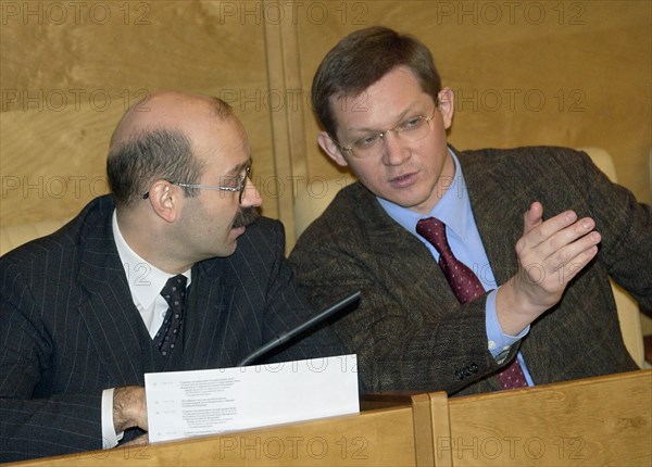 Vladimir ryzhkov (right) member of the russian federation duma (parliament), at the state duma's first plenary sitting, december 2003.