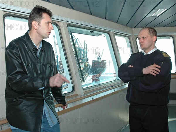 Mikhail prokhorov, the director general of the norilsk nickel jsc, and captain vladimir gusarevich (l-r) are pictured on board the ice class container ship “norilsk nickel”, the first vessel in the company’s fleet, krasnoyarsk territory, russia, april 25, 2006.