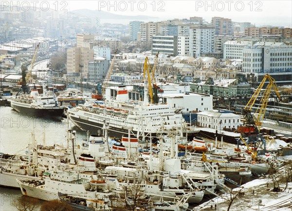 Cruise ships and fishing vessels in the port of vladivostok in russia.