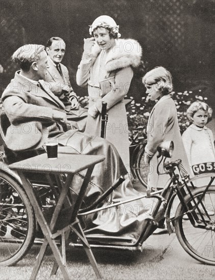 The Duchess of York with her daughters Princesses Elizabeth and Margaret in 1933 on a visit to The Disabled Soldiers' Embroidery Society