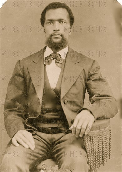 Portrait of an African American man, seated