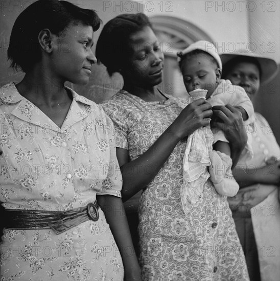 African American Women in front of the bank