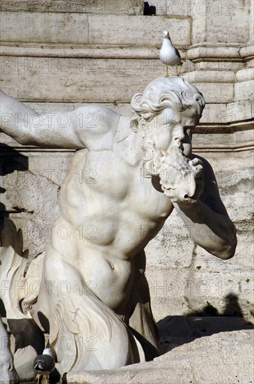 Trevi Fountain. Triton with a sea shell.