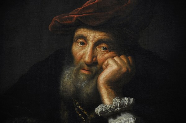 Old man, leaning on a cushion. Copy. By Govert Flinck