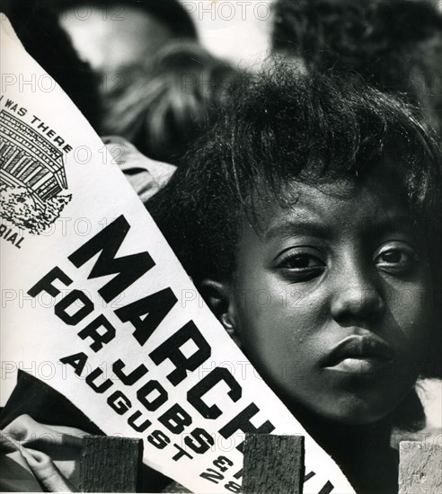 Girl with flag at March on Washington