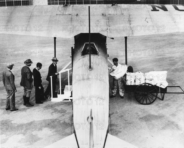 Passengers & Mail Loaded Into Fokker