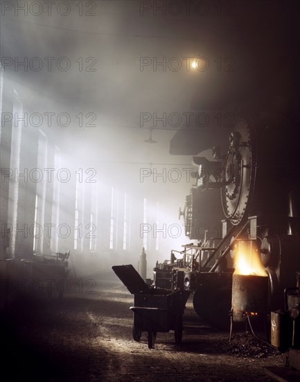 In the roundhouse at a yard of the Chicago and Northwestern [i.e. North Western] railroad, Chicago, Ill. December 1942.