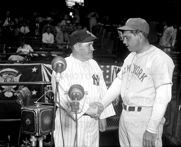 Rival All-Star managers. Washington D.C., July 7. Joe McCarthy, manager of American All-Stars, and Bill Terry, leaders of the Nationals, pose before their respective teams took the field today for the 1937 game at Griffith Stadium..
