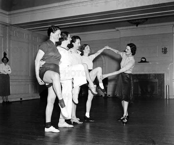 Women dancing in dance studio circa 1936.