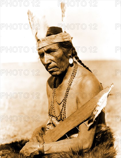 Edward S. Curtis Native American Indians - Fat Horse with insignia of a Blackfoot soldier circa 1927.