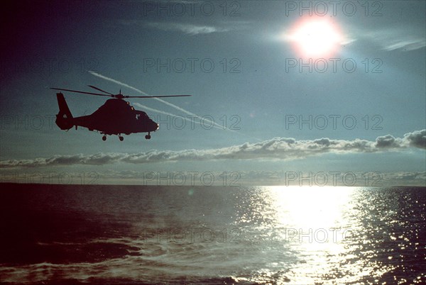 HH-65A Helicopter in flight.