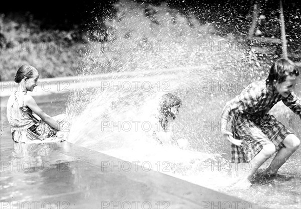 Children playing in a swimming pool