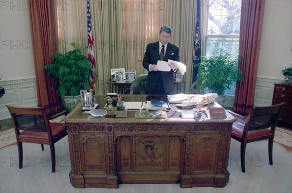 President Reagan alone in the Oval Office 1988.