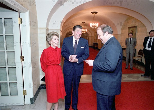 President Reagan Nancy Reagan talking with James Brady.