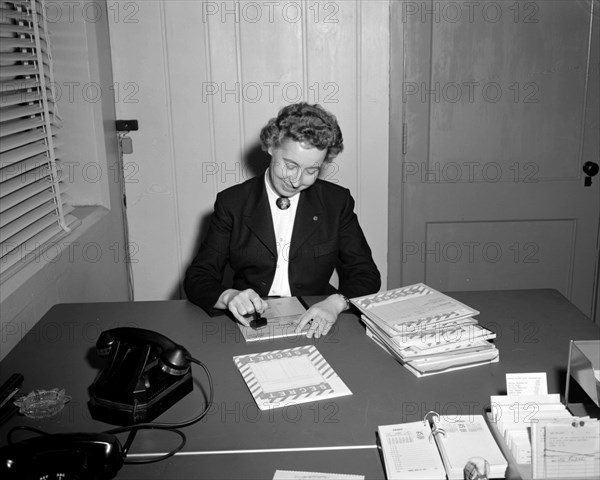 1960s female worker at desk