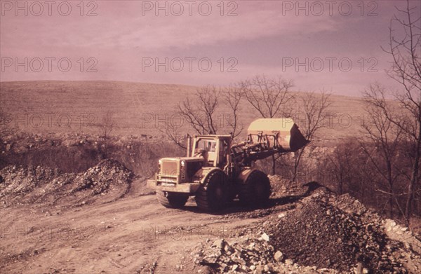 A Bulldozer Prepares A Path for One of the Huge Coal Shovels