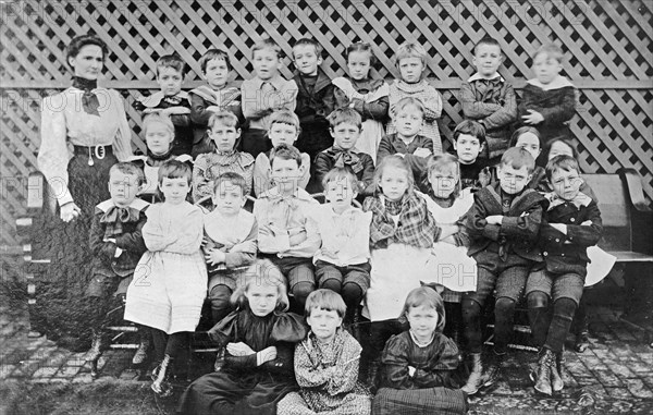 Miss Dyer school group, children group photo, arms crossed ca.  between 1910 and 1935