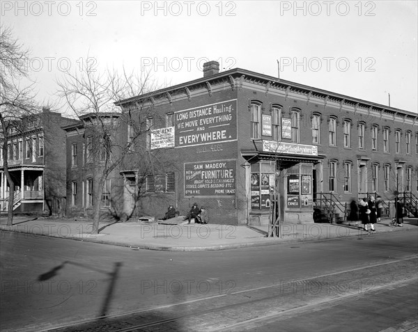 Street scene, rowhouses and moving company, Washington, D.C. ca.  between 1910 and 1926