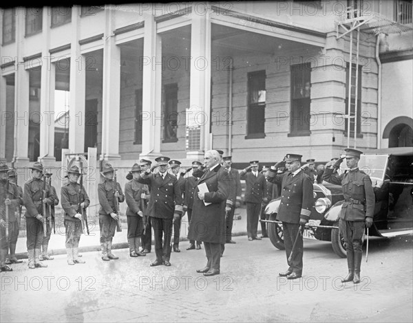 Military group salute with President Harding ca. between 1909 and 1940