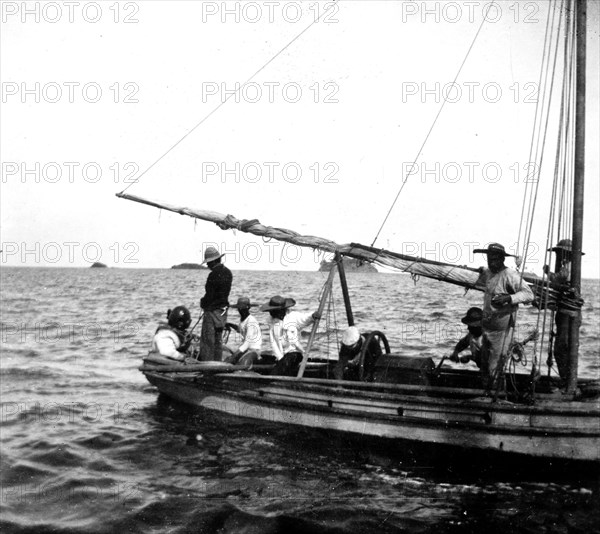 Men on boat ca.  between 1918 and 1920