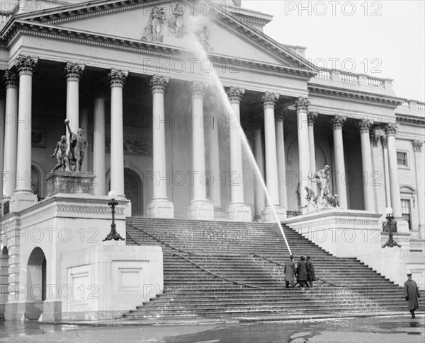 Men washing the U.S. Capitol ca.  between 1918 and 1920