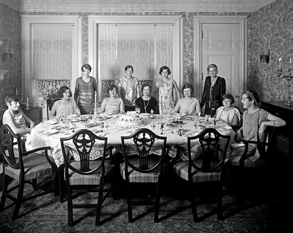 Group of women at dinner party / birthday party ca.  between 1918 and 1928