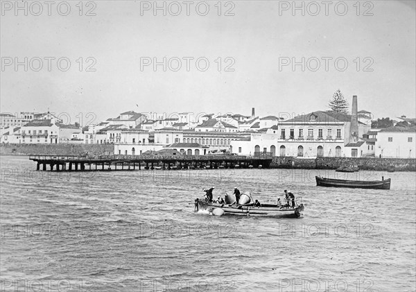 Men planting bouys for the trans atlantic fliers to moor to Ponta del Gada [Delgada] ca.  between 1918 and 1928