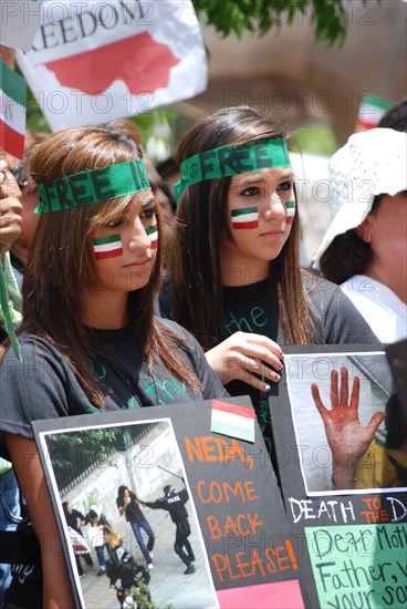 Iranians in Texas taking part in a Freedom for Iran / Green Revolution rally at Dallas City Hall plaza in downtown Dallas, TX ca. June 2009