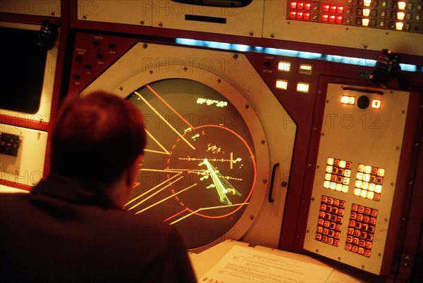 1980s Air Traffic Controllers monitoring a radar screen