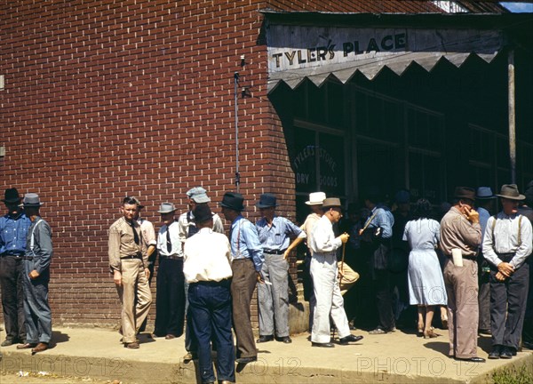 Farmers and townspeople in center of town on Court Day