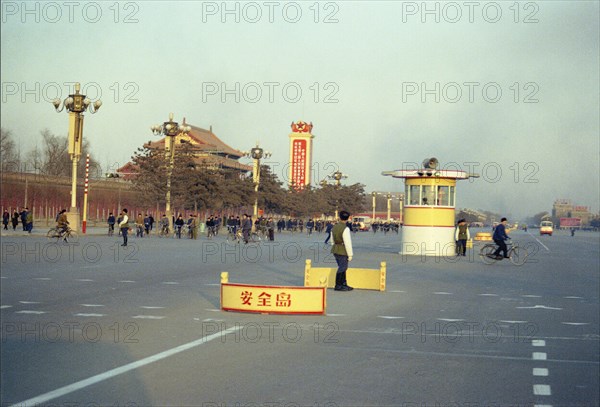 Street Scene with Signs and Bicyclists in Peking