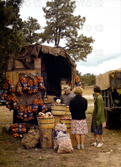 Fruit wagon at small town fair in New Mexico October 1940